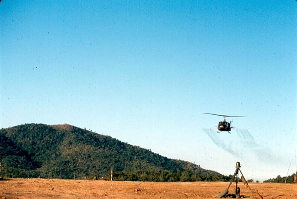 Agent Orange?
No notes on slide, but this may be an helicopter outfitted with sprayers to lay down a defoliant.
