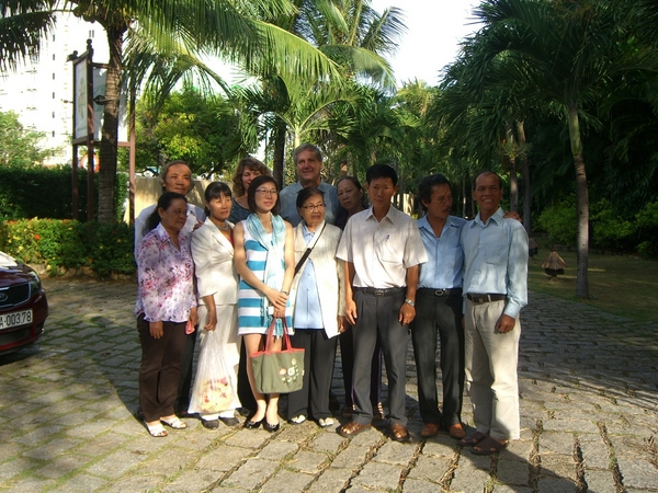 44 Years Later!
Just amazing!  The son of Capt Ronald Rod, who helped this Orphanage as a "Military Advisor" and was later KIA, visited the Orphanage in 2011.  In this photo are six (6) of the original orphans along with Sr. Emmilene, who founded the Duc Pho Orphanage in 1966.  Capt Rod was one of my ROTC Cadre at Loyola.
