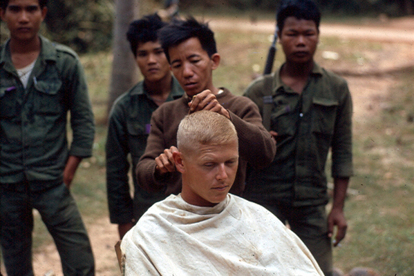 Outdoor Barbershop
A risky proposition, perhaps.  It's a good idea to know whose cutting your hair in a combat zone.
