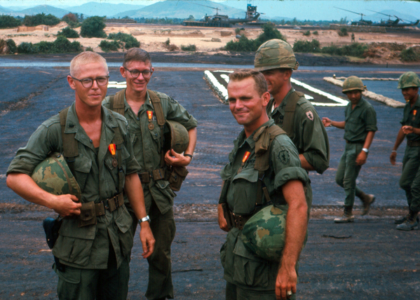 Awards Day
Lt Dennis Munden, FO; Lt Jim Deloney, FO, and Capt Doug Johnson receive medals at a Vietnamese awards ceremony at Brigade Base Camp.
