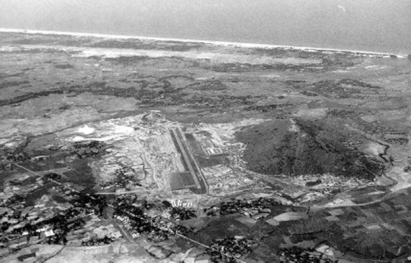 LZ Montezuma - High Aerial View
Excellent aerial shot of LZ Montezuma.  South China Sea at top, 3rd Bde landing strip in center, and famous hill serving as backdrop.  The US Marines first occupied this area before turning it over to the 3rd Bde in the Spring of 1967.  It served as the HQ for the 2/9th for many months.  Photo courtesy of CPT Don Parrish, (1/35 Inf Commo Officer).

