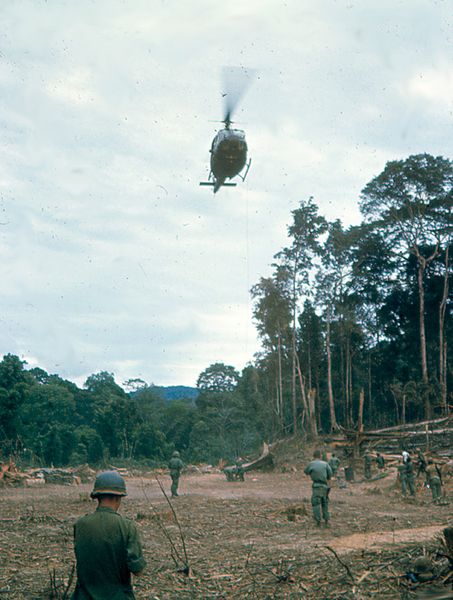 Prisoner
If you enlarge this photo, the rope is faintly visible; it was the rope that lowered the NVA prisoner to the ground.
