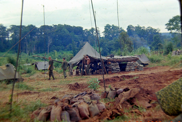 R-292's
Radio antennas grouped around battery area.  One of our better bunker jobs.  Walking away to the left is a red-headed Lieutenant.  (Most likely Lt Chris Herrick).
