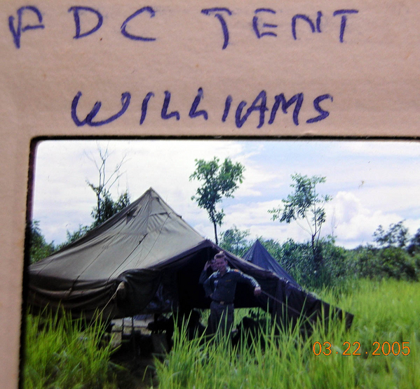 "Willy" Wilams
PFC Richard A. (Willy) Willams standing outside the ten in the elephant grass.
