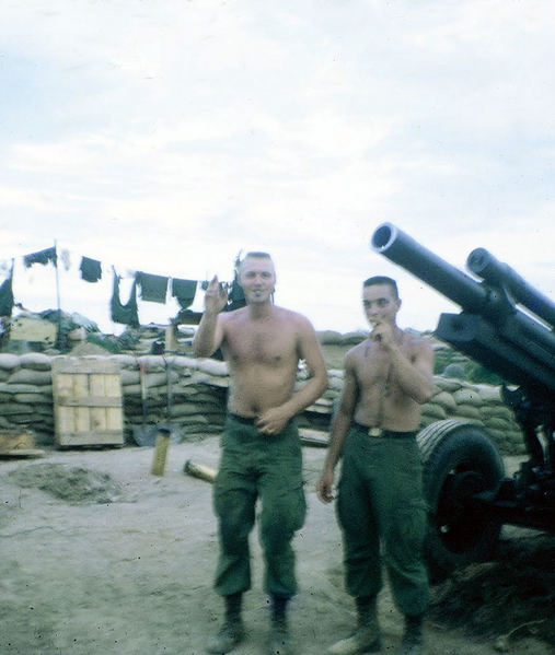 Hourigan & Co
PFC James G. Hourigan & Sp4 Ronald Hammond standing in the gun pit at LZ OD, 1967.  Sunshine takes care of the laundry in the background.

