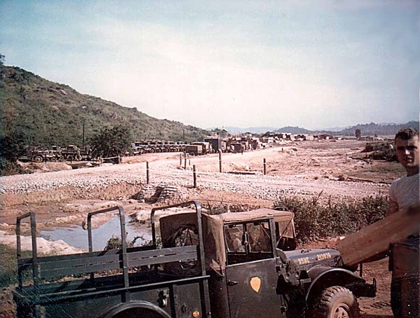 My Lifesaver - USMC
Referring back to my "War Story" about the Marine who may have saved my life and lived in the tent behind our commo tent in Duc Pho? This is him, just off in the right of this Polaroid. And Notice the Marine Corps 3/4-ton truck down below.

