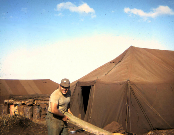 Gene Little
Sp4 Gene R. Little working at Base Camp, 1966.
