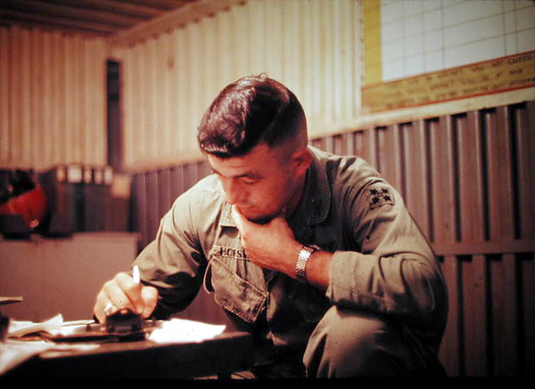 Underground TOC
Capt David Horswell working the Intel reports…planning the night “Horses and Indians” (harrassment and interdiction) Artillery fire…2/9th underground TOC.  May ‘69

