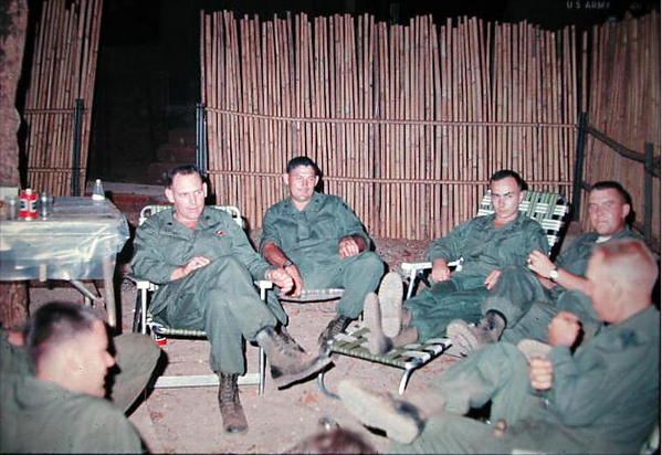 The Bn Staff, 2/9th
Our version of the good times..2/9th Battalion Officers Club…the BnCOl with his Staff at the “Oasis”.
Bottom left-UNK, LtCol Forrester, UNK, Capt Finley, Maj Jerry Orr, and UNK

