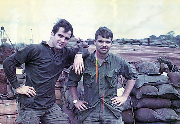 The FO Team
We survived!

At Left: Me and FO Lt Joe Hannigan from Philly, PA with both hands on hips.  This may be the Christmas standown at LZ Lois in 1969.  The next day, we were back in the bush.
