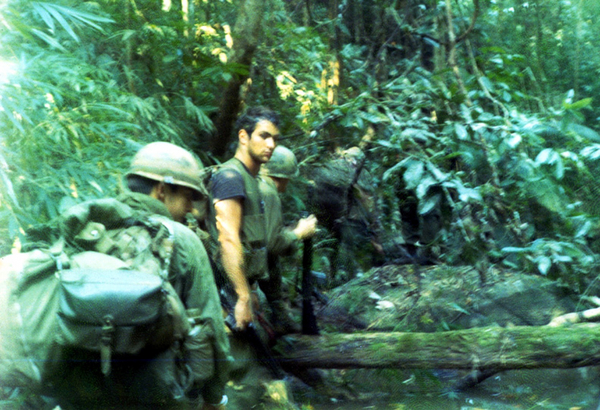 Running thru the jungle
Rick is in the lead in the black shirt; medic David "Doc" Brown is right behind him.
