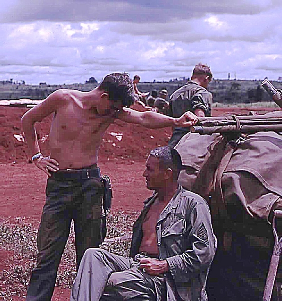 Command Conference
The Lieutenant and our TopKick compare notes.   We now know that the man seated is 1SG Clifford J. Pullan and the man at left is either Lt Moyers or Lt Baumgartner. 1SG Pullan passed away in January, 2015.
