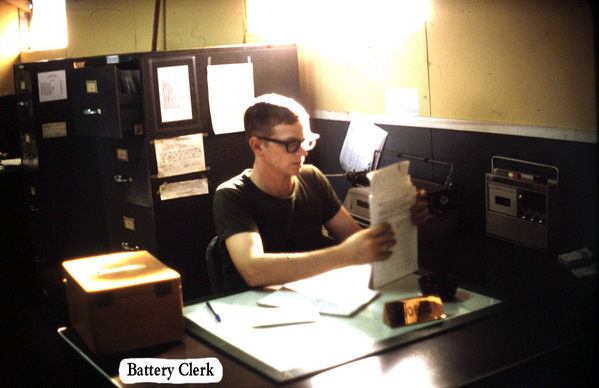 Battery Clerks of the 2/9th Arty
Almost looks like he's working stateside.  He's James L. Keller, 2/9th Hq, Svc Battery.  Photo dated 1969.

{Webmaster Note: It's interesting to compare the photos from 1966 to the ones in '69 and later.  It looks like we were eventually fighting a stateside war overseas.  I refer to it as a "summer camp live fire exercise"}
