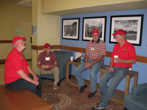 Arrival
Telling war stories in the Lobby.  Geary Burrows seems to have the floor.  Terry Stuber at right, Bob Bowden on chair, J William Ward at right.

