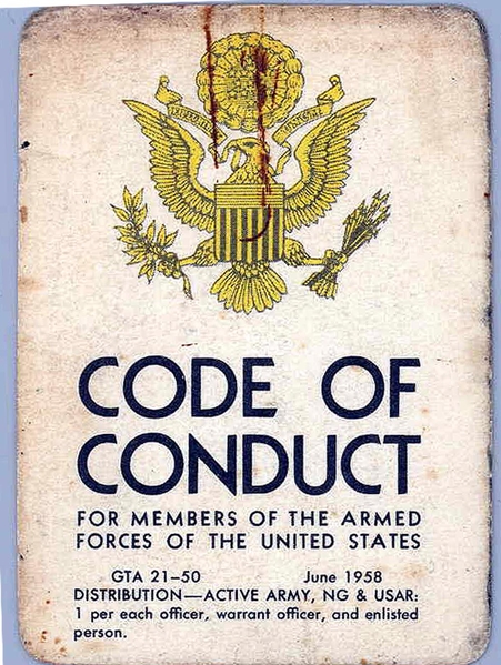 Also "worn"
Close by to the OD underwear were some military mementoes that survived his tour in Nam.  First page of the Code of Conduct.
