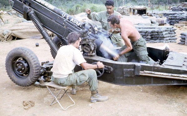 Crew in action
Clearing the breech from a fired shell. SP4 Rick Satterfield is the Gunner; PFC Mike Steele is the Loader (notice the duck tails), and PFC Tony Heredia is the Asst Gunner.
