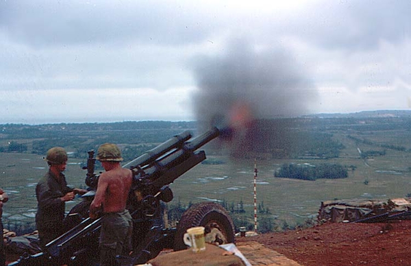 Leaving the muzzle
This photo catches the exhaust perfectly as yet another 105mm round heads downrange.
