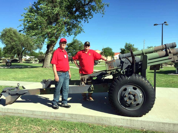 The 105mm howitzer, M1A1
Yep...this is it.  William Ward and John Bowden bring back memories of our famous cannon at the museum grounds.

Photo courtesy of William Ward.
